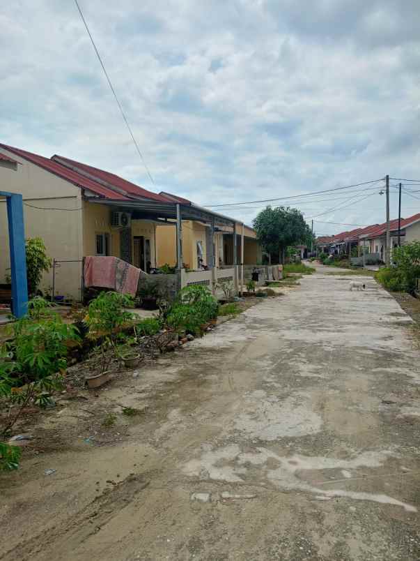 over kredit rumah subsidi jln beringin ujung air hitam