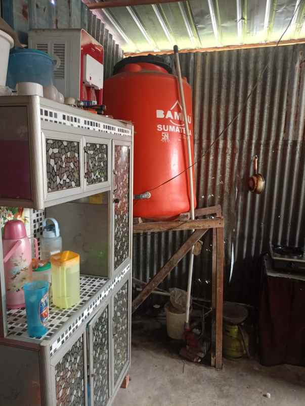 over kredit rumah subsidi jln beringin ujung air hitam