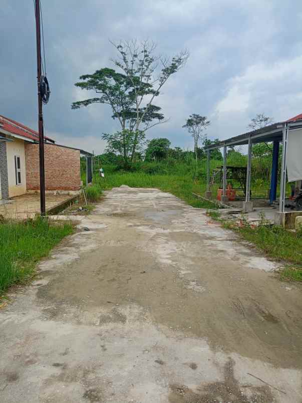 over kredit rumah subsidi jln beringin ujung air hitam