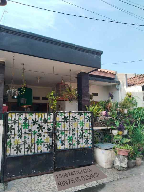 rumah komplek pesona anggrek