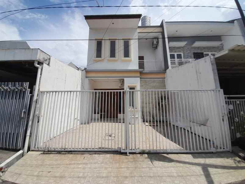 rumah minimalis darmo permai utara one gate system