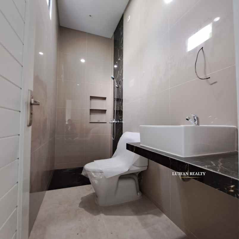 rumah modern minimalis dalam cluster dekat tol andara