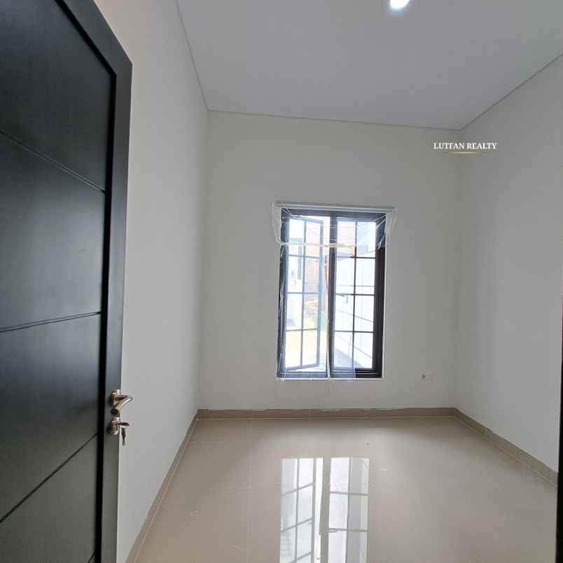 rumah modern minimalis dalam cluster dekat tol andara