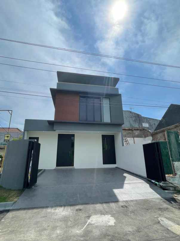 rumah semi furnish babatan pantai surabaya baru gress