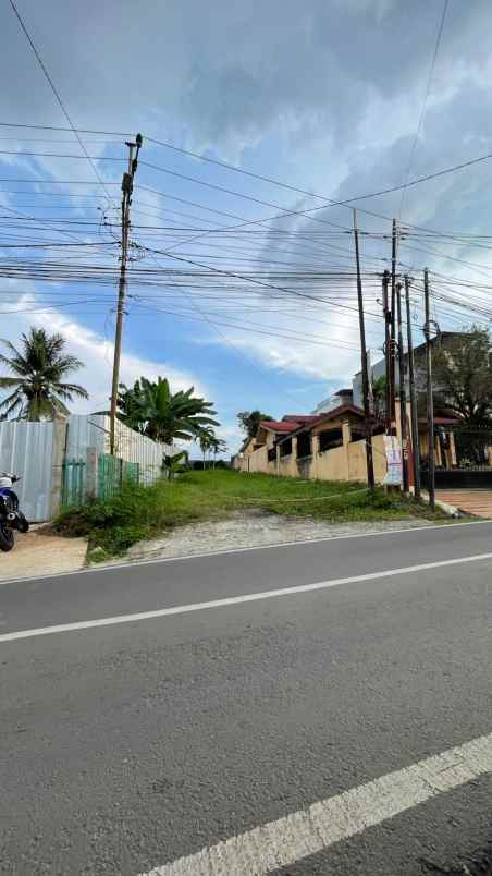 tanah pinggir jalan sukatani dekat pom blk