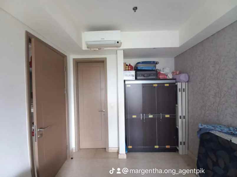 apartemen gold coast pik tower caribean semi furnish