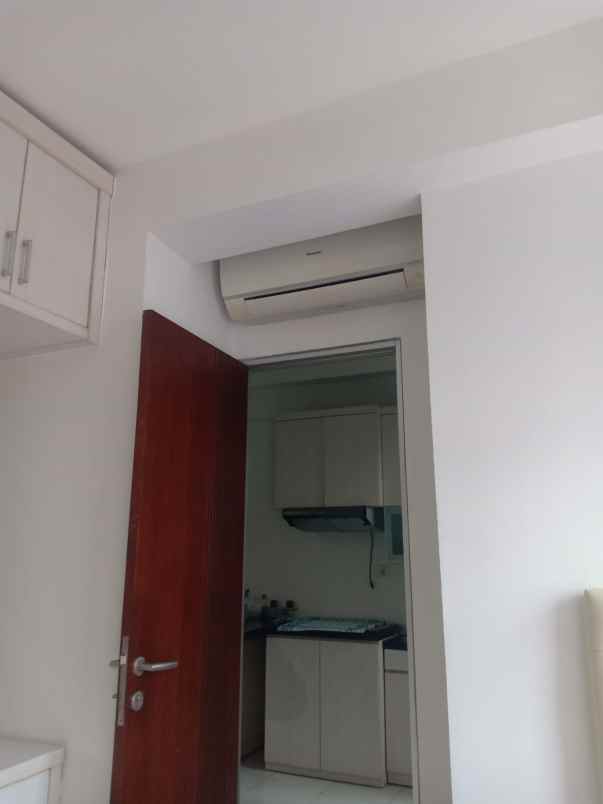 apartemen gunawangsa manyar tower a 2 unit jadi 1