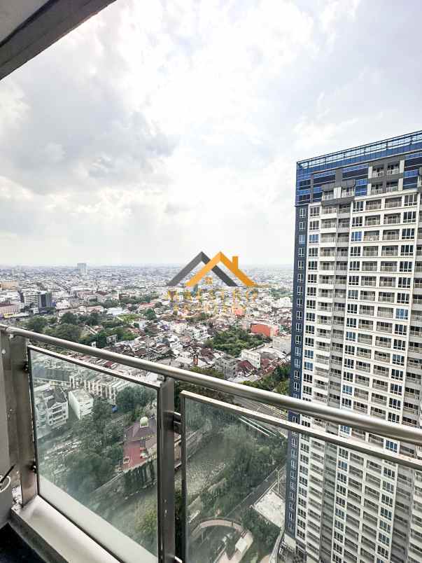 dijual apartemen tribeca condominium