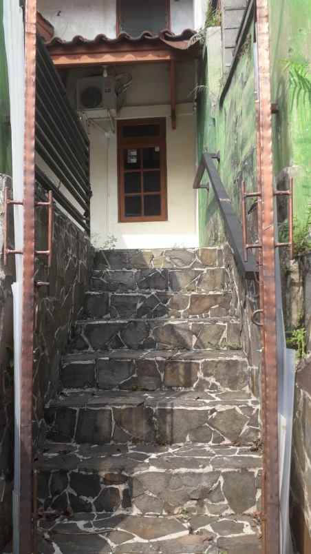 dijual rumah beji