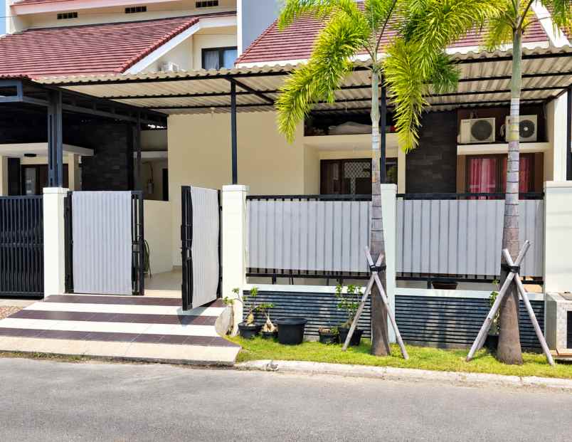 dijual rumah cluster aralia harapan