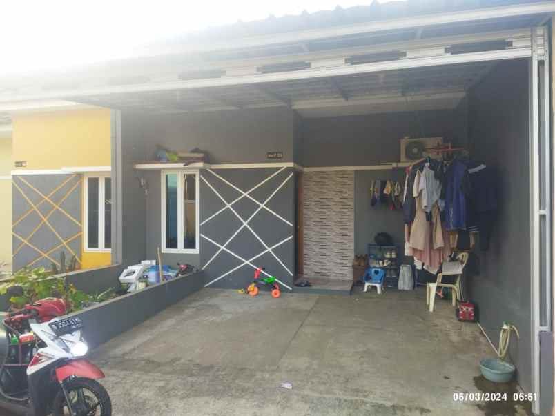 dijual rumah jl raya puspa sari