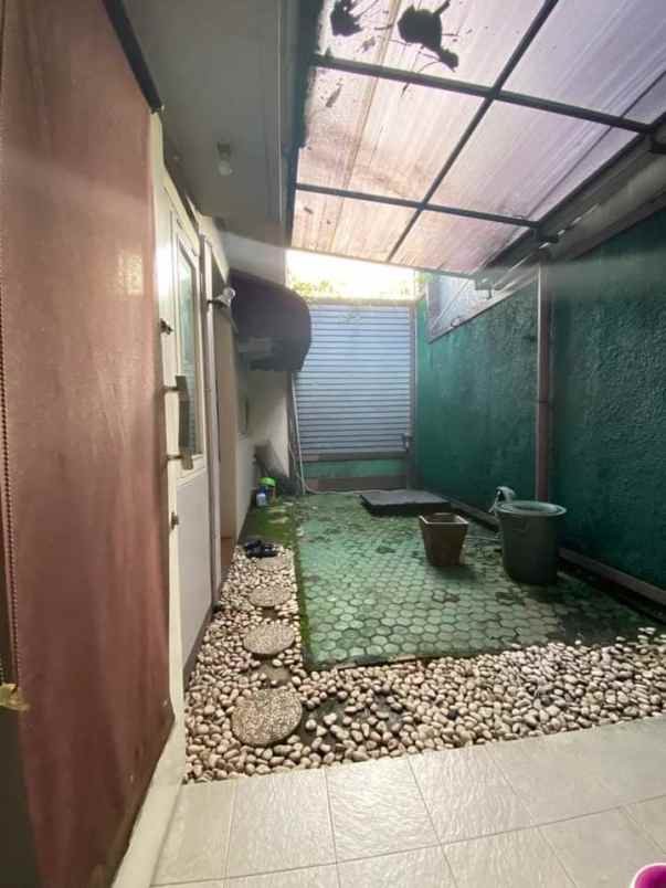 dijual rumah komplek puri andora serua