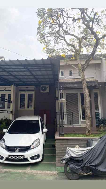 dijual rumah komplek puri andora serua