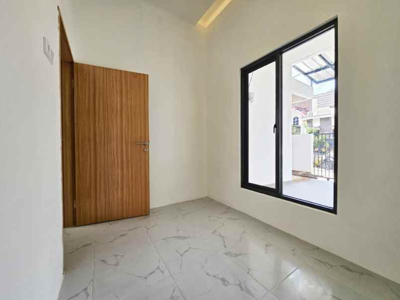 dijual rumah perumahan taman harapan