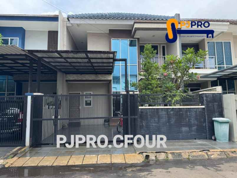 dijual rumah taman modern