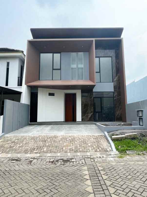dijual rumah woodland citraland