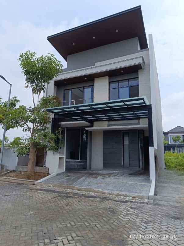 new house minimalis modern di citraland surabaya barat