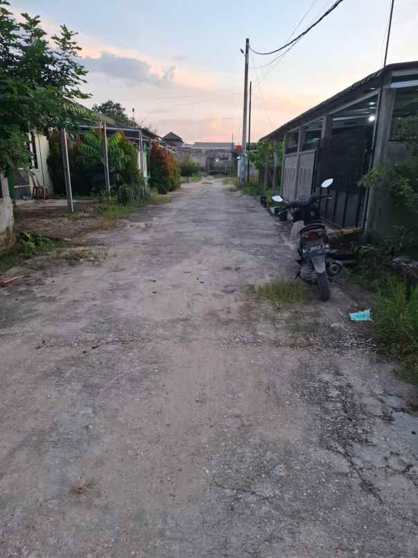 over kredit rumah jl suka karya kualu panam