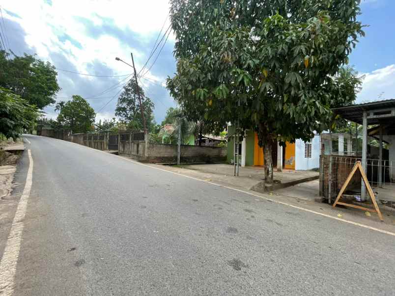 rumah dan tanah pinggir jalan tanjung barangan