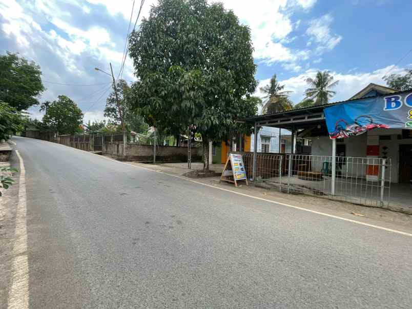 rumah dan tanah pinggir jalan tanjung barangan