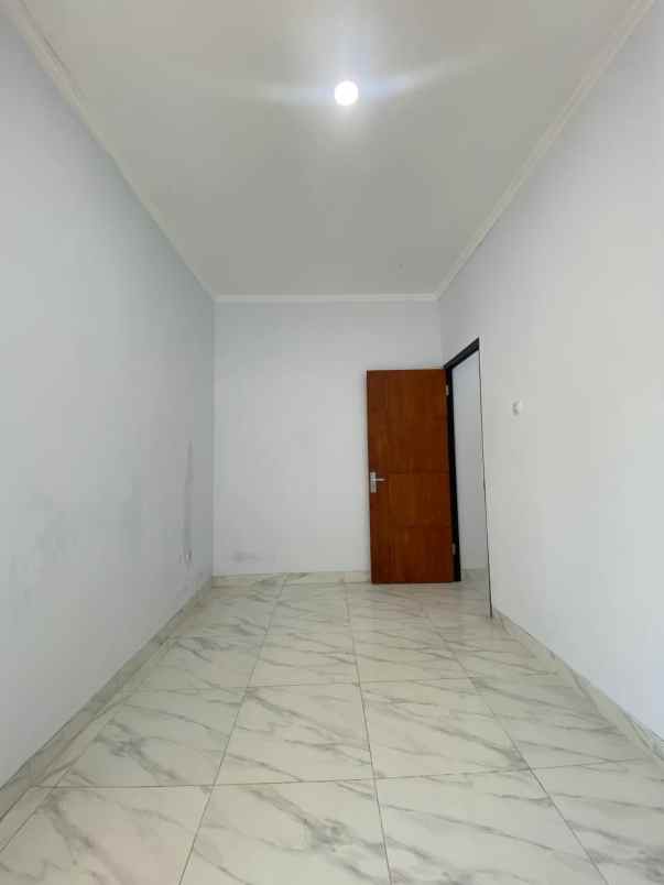 rumah dp 0 siap huni 2 lantai dekat stasiun