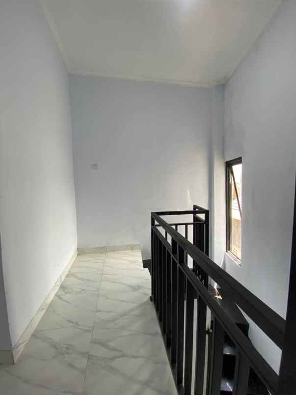 rumah dp 0 siap huni 2 lantai dekat stasiun