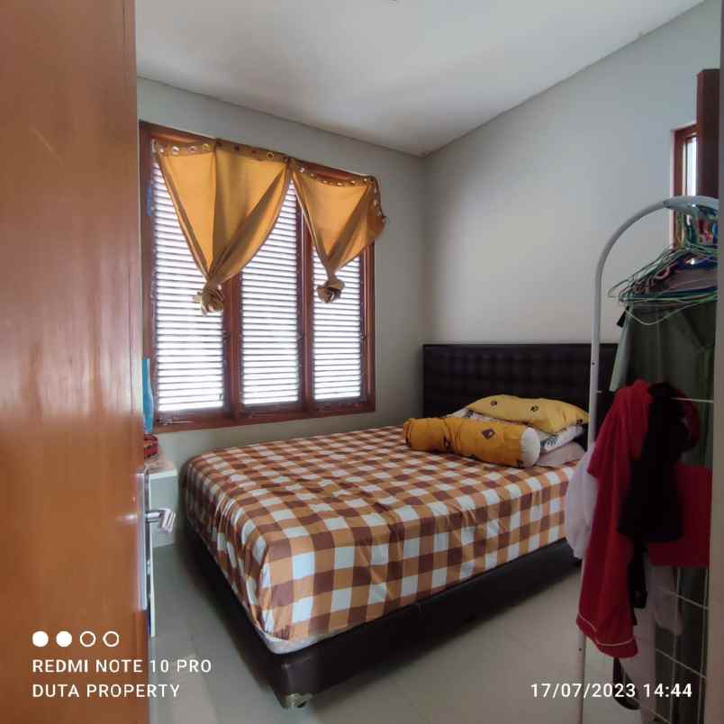 dijual rumah di dalam cluster puri