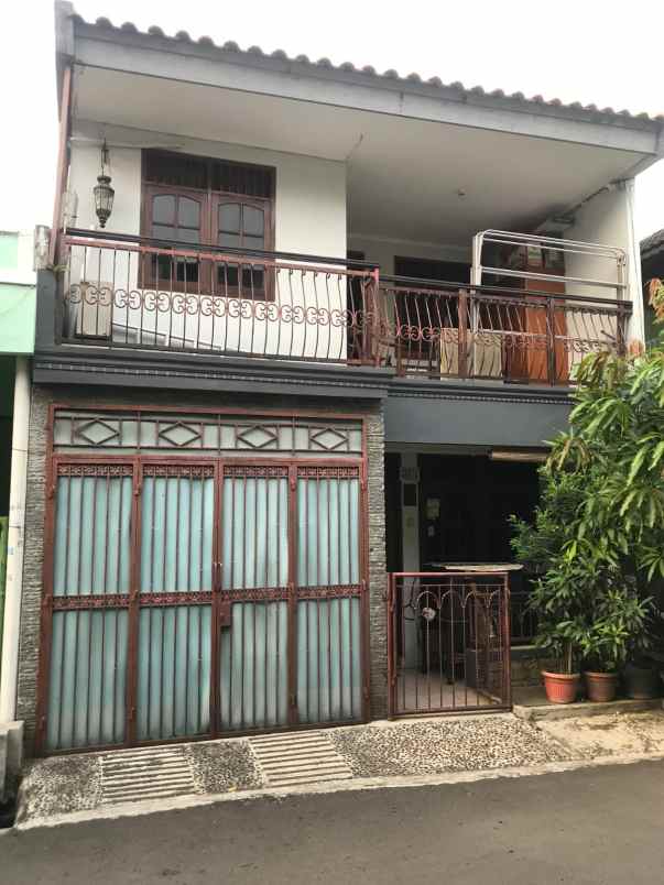 dijual rumah jln merpati kp tengah