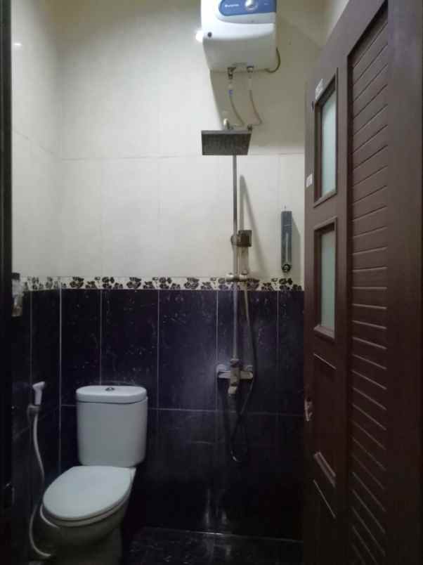 dijual rumah perumahan taman harapan