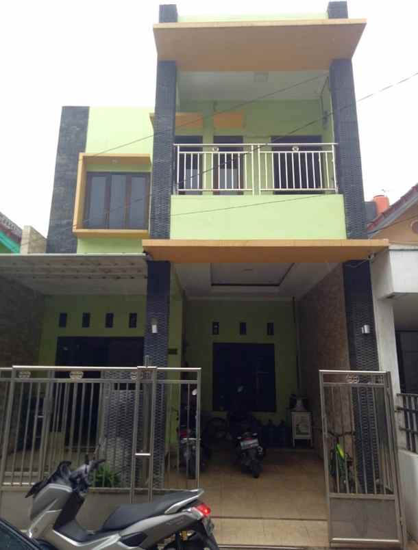 dijual rumah perumahan taman harapan