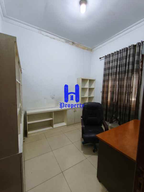 disewakan rumah komplek cemara hijau jalan