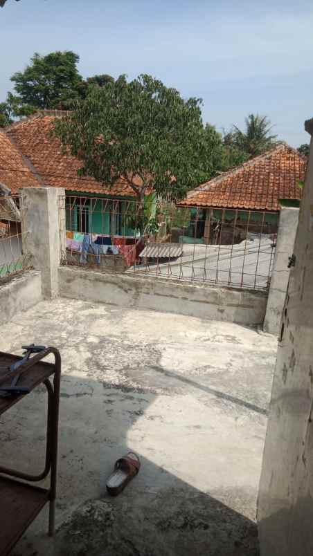 jual rumah kampung suasana asri