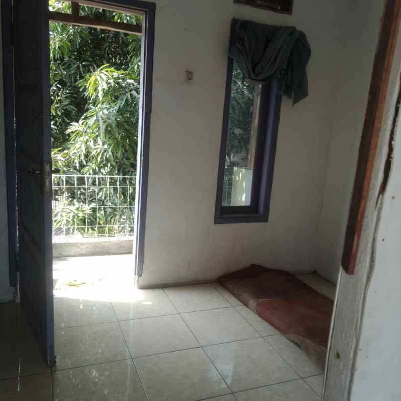 jual rumah kampung suasana asri