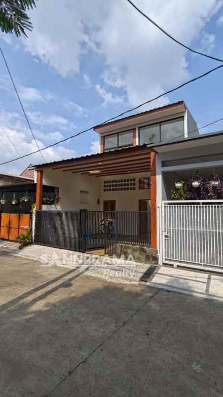 rumah 2 lantai siap huni dalam perumahan beji rilin