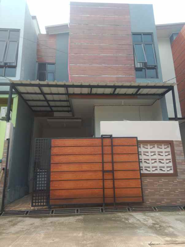 rumah 2 lantai siap huni semi furniture free pajak