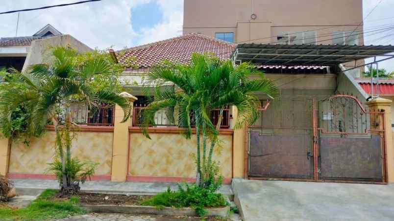 rumah ngagel jaya tengah hadap utara