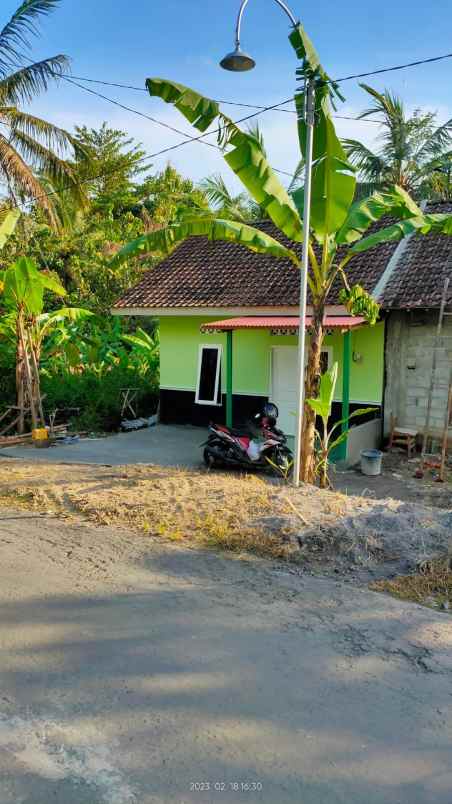 rumah siap huni tepi jalan aspal lebar dijual murah