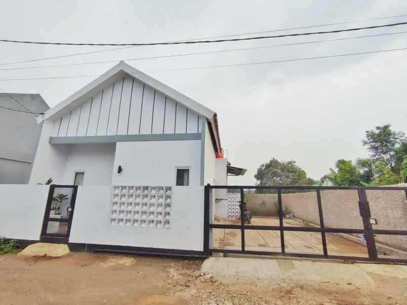 rumah terawat modern dijual tanah luas strategis