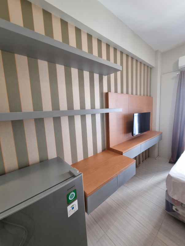apartemen puncak dharmahusada tipe studio