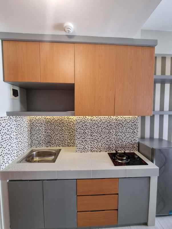 apartemen puncak dharmahusada tipe studio
