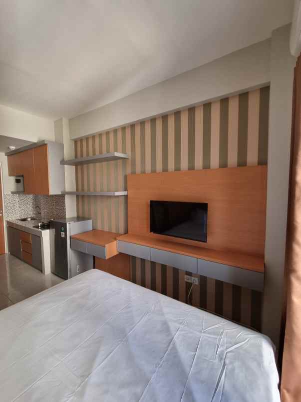 apartemen puncak dharmahusada tipe studio