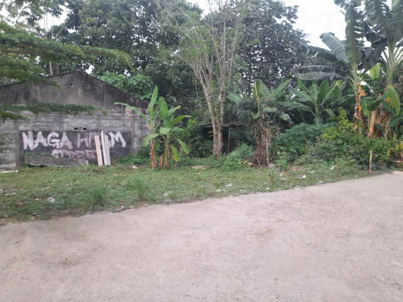 di tanah bangunan lokasi pinggir setu cikaret