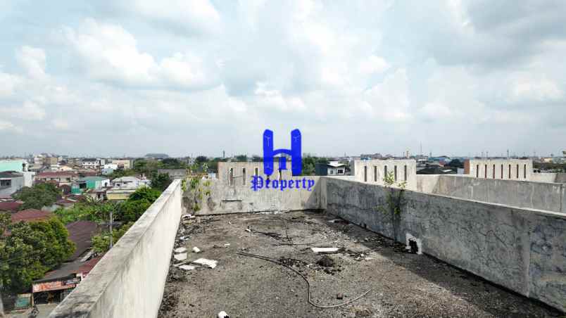 dijual ruko gudang kantor jalan h m joni depan ex giant