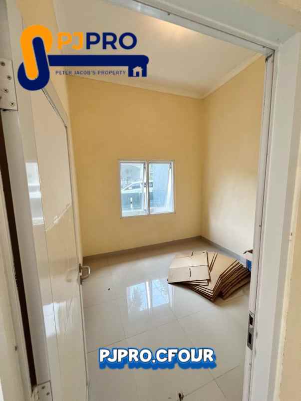 dijual rumah cluster duta bumi 1