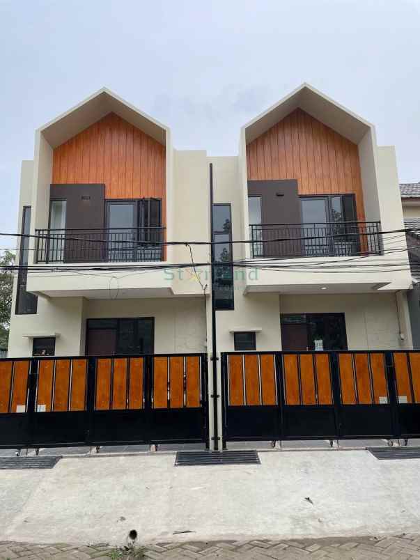 dijual rumah graha raya