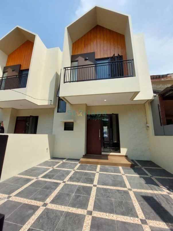 dijual rumah graha raya