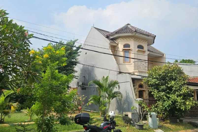 dijual rumah graha raya dahlia loka