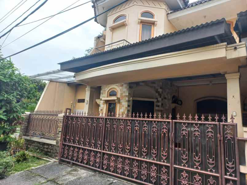 dijual rumah graha raya dahlia loka