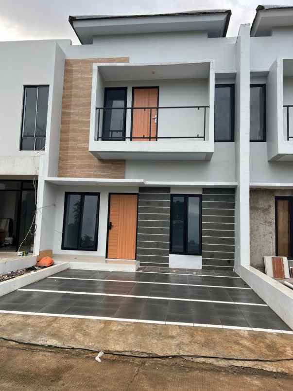 dijual rumah jl h tari taman rahayu