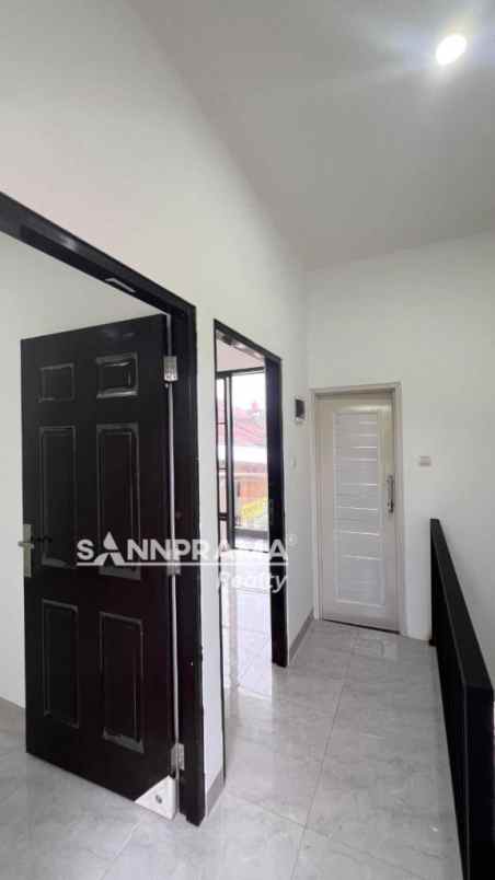 dijual rumah jln raya tapos depok
